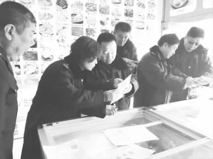 临汾:工商人员进市场 百姓消费更放心