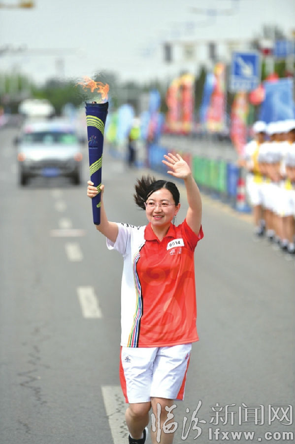 二青会火炬在蒲县汾西霍州洪洞传递