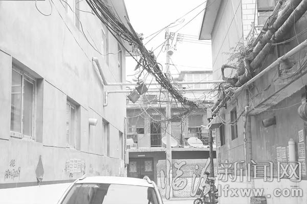 空中“蜘蛛网”市民盼规范