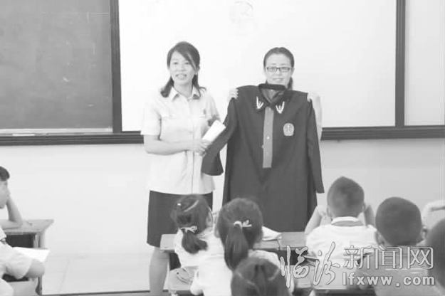 临汾中院:法制观念根植校园